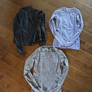 Set of 3 Lululemon size 4 Tops - Black quarter zip, Gray , purple Swiftly